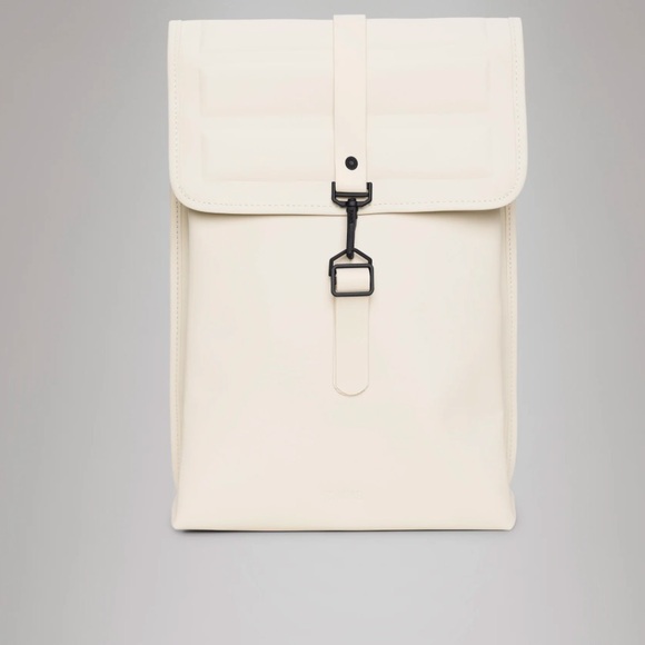 RAINS Shield Rucksack is a clean and functional backpack. Elegant Cream Backpack - Picture 3 of 11